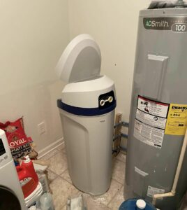 Water softener and water heater installed for efficient and reliable home plumbing. Plumber in Evansville & Madison